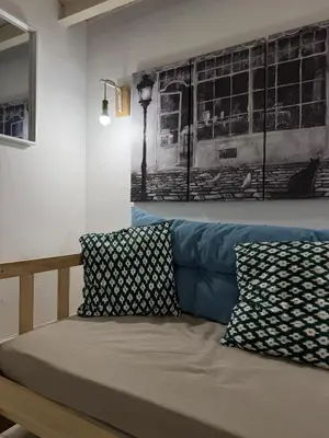 Letto o letti in una camera di Carmela Homes&Residences ortigia