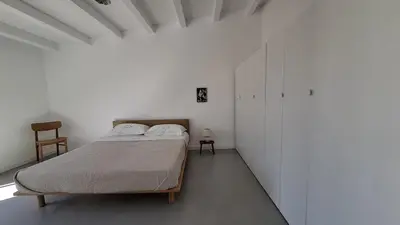 Letto o letti in una camera di Petite maison près de la mer