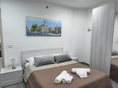 Letto o letti in una camera di Garibaldi guest house