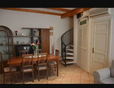Area soggiorno di Amuni Home