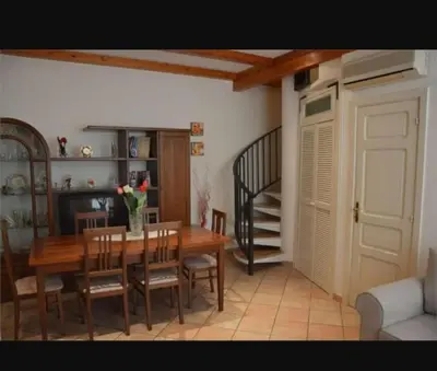 Area soggiorno di Amuni Home