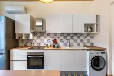 Cucina o angolo cottura di GuestHost - Reb's House
