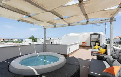 Area soggiorno di Cozy Apartment In Marzamemi With House Sea View
