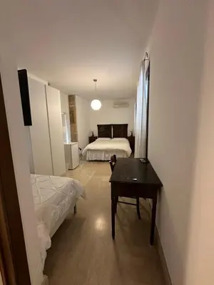 Letto o letti in una camera di Crispi 10