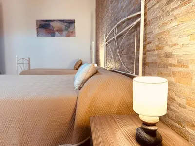 Letto o letti in una camera di Ortilì