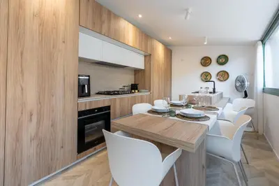 Cucina o angolo cottura di Vico Trigona con terrazza e jacuzzi riscaldata