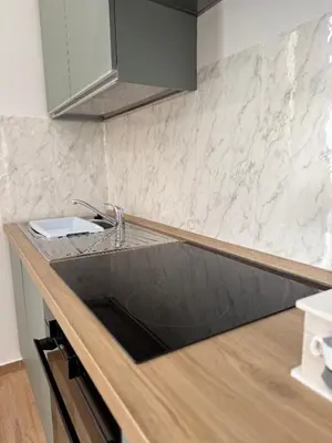 Cucina o angolo cottura di LIONS ROOMS Augusta