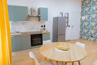 Cucina o angolo cottura di LIONS ROOMS Augusta