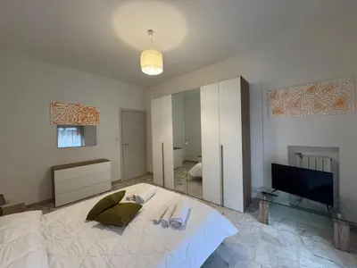 Letto o letti in una camera di Alisea Home