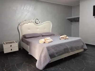Letto o letti in una camera di Mr Peppe house