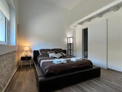 Letto o letti in una camera di Pietre al Sole di Sicilia