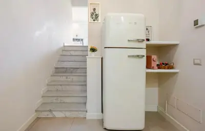 Cucina o angolo cottura di Spàzio apartments Sangiuliano