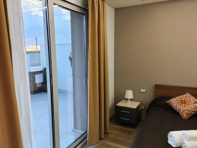 Area soggiorno di Garden Relax Suites