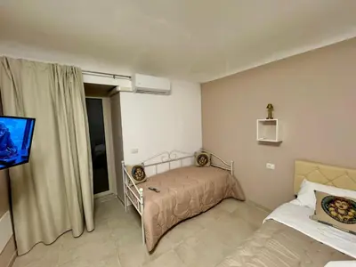 Letto o letti in una camera di Helena's House