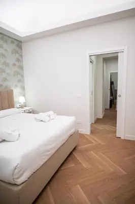 Letto o letti in una camera di Casa Amenano Vista Castello Ursino