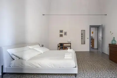 Letto o letti in una camera di Corte dell'Agave