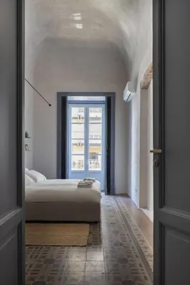Letto o letti in una camera di Corte dell'Agave
