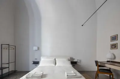 Letto o letti in una camera di Corte dell'Agave