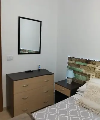 Letto o letti in una camera di Home Stella