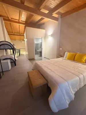 Letto o letti in una camera di Home The Rose
