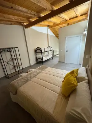 Letto o letti in una camera di Home The Rose