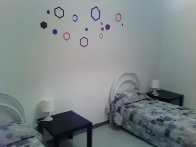 Letto o letti in una camera di Holiday Home White House Ferienhaus in Syracuse by Interhome