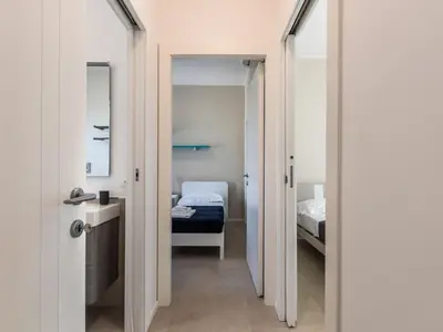 Letto o letti in una camera di Holiday Home 'Villa Luisa' mit Pool by Interhome