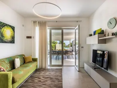 Area soggiorno di Holiday Home 'Villa Paolo' mit Gemeinschaftspool by Interhome
