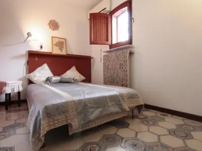 Letto o letti in una camera di Holiday Home für 12 Personen in Syrakus by Interhome