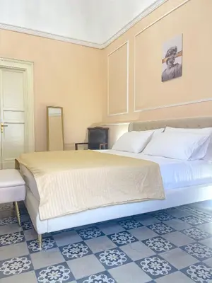 Letto o letti in una camera di Flame B&B