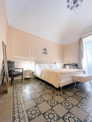 Letto o letti in una camera di Flame B&B