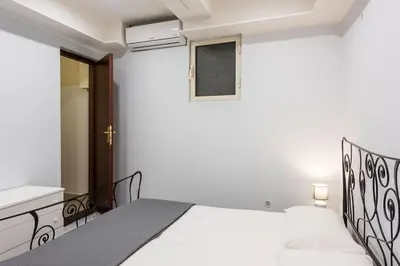 Letto o letti in una camera di Le Dimore del centro - Ursino