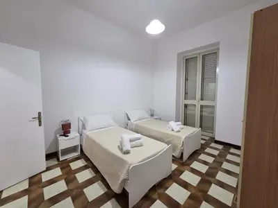 Letto o letti in una camera di Casa Vacanze C&G
