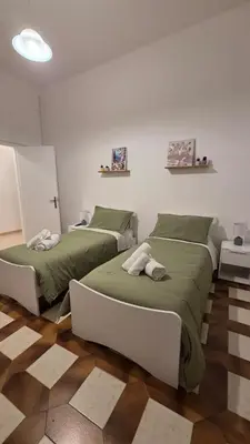 Letto o letti in una camera di Casa Vacanze C&G