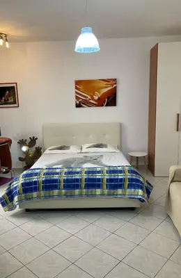Letto o letti in una camera di The Ronco Apartment