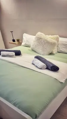 Letto o letti in una camera di NestCity