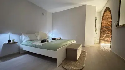 Letto o letti in una camera di NestCity