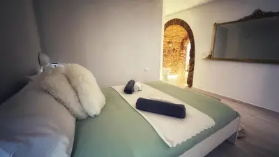 Letto o letti in una camera di NestCity