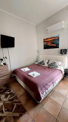 Letto o letti in una camera di Sapore Di Arancia