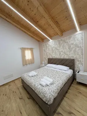 Letto o letti in una camera di Three diamonds house