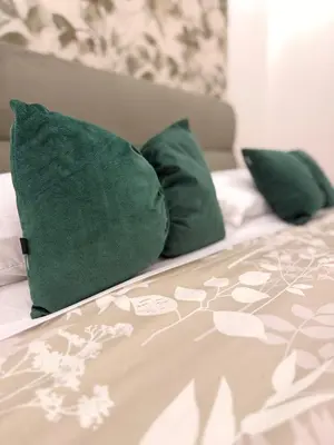Letto o letti in una camera di Three diamonds house
