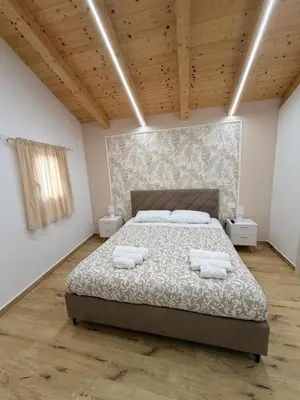 Letto o letti in una camera di Three diamonds house