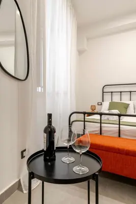 Letto o letti in una camera di C'est la vie Catania