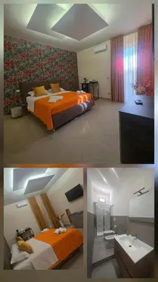 Letto o letti in una camera di New Golden house sicily