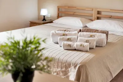 Letto o letti in una camera di Villa Margi