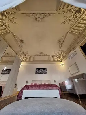 Letto o letti in una camera di casa teatro 2