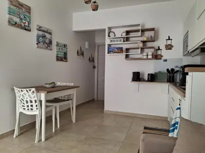 Cucina o angolo cottura di Casa Dalia - appartamento a Marzamemi, vista mare