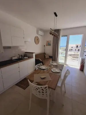 Cucina o angolo cottura di Casa Dalia - appartamento a Marzamemi, vista mare