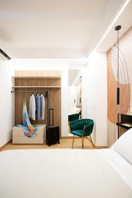 Letto o letti in una camera di Naos 71- Appartamento con balcone vicino Ortigia