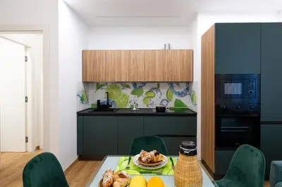Cucina o angolo cottura di Naos 71- Appartamento con balcone vicino Ortigia
